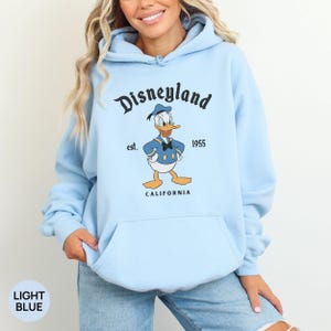 Sudadera retro de Minnie y Mickey Mouse para pareja en Disneyland. Sudadera con capucha para viaje familiar a California en Disneyland (establecida en 1955). Daisy y el Pato Donald. imagen 11