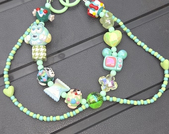 Leuke groene m&m-tashanger