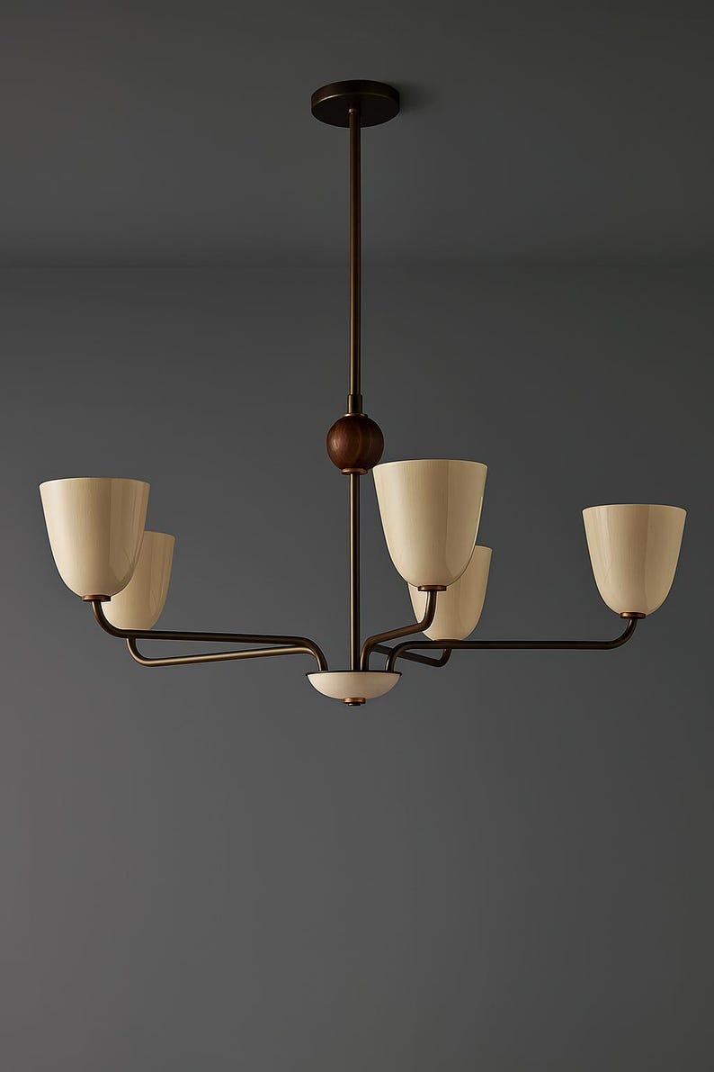 May include: A modern chandelier with five cream-colored, tulip-shaped shades. The fixture has a dark bronze finish with a wooden sphere accent. The arms extend horizontally from a central stem.