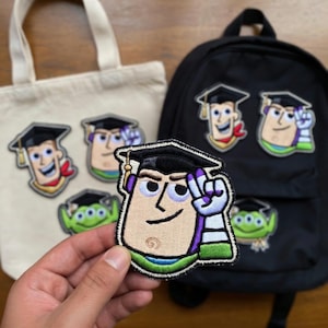 Toy Story Examenslappar, Woody Buzz Alien Stryk-på-applikation, Klass 2026