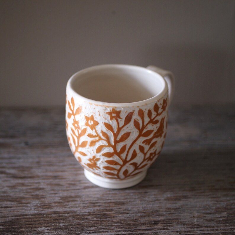 Cup Birds and a Bunny Handmade in Porcelain and Decorated all over with Rusty Brown Flowers