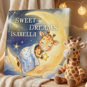 May include: A children's book titled "Sweet Dreams, Isabella" featuring a sleeping giraffe on a crescent moon. A plush giraffe toy sits beside the book. The scene is set on a wooden shelf with a cream-colored blanket and a star-shaped night light.
