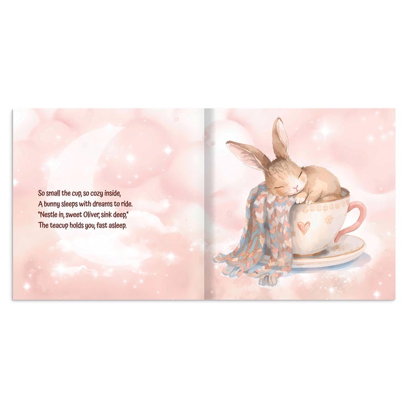 May include: A children's book illustration shows a sleeping bunny nestled in a teacup. The bunny is covered with a blue and white patterned blanket. The teacup is white with a pink handle and a heart design. The background is a soft pink with text.