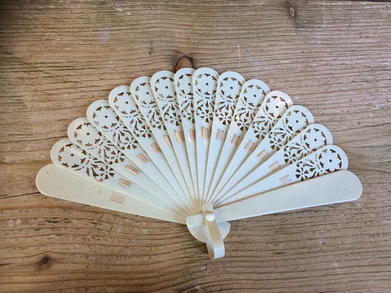Gorgeous Vintage Art Deco Cream Celluloid Fan with Pierced Floral Design