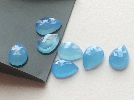 3 pieces of BLUE CALCEDONY PEARS facetted 19x14mm to 14x18mm