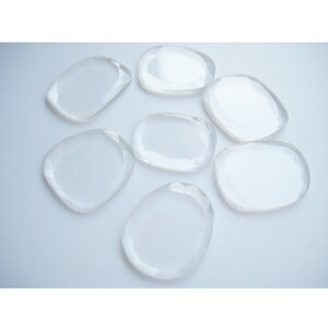 May include: Seven clear, smooth, oval-shaped silicone makeup sponges.