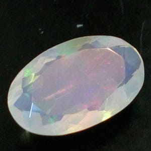6.5x10.5mm Huge Ethiopian Opal Oval Cut stone, Natural Faceted Opal, Oval Cut Stone, Faceted Fire Opal For Jewelry, Opal With Fire 1.10 Cts