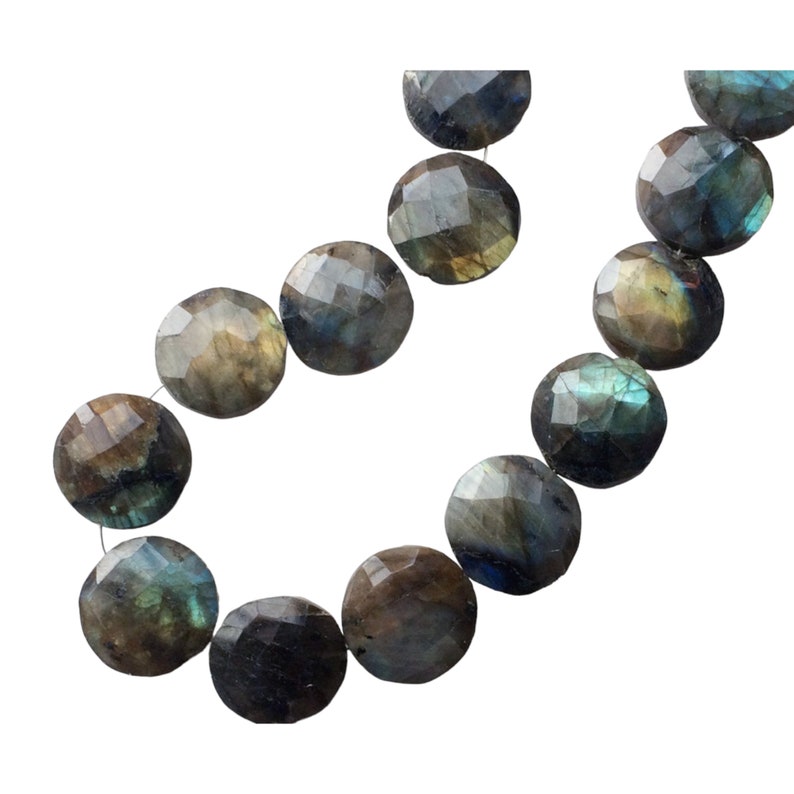 May include: A strand of round, faceted labradorite beads in shades of gray, green, and brown. The beads are strung on a clear thread.