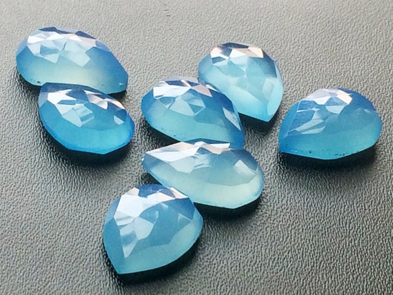 3 pieces of BLUE CALCEDONY PEARS facetted 19x14mm to 14x18mm