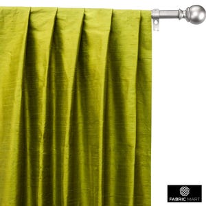 May include: A pair of green silk curtains with pleats hanging from a silver curtain rod.