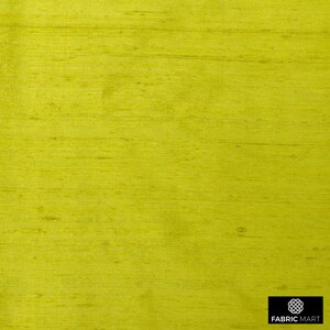 May include: A close-up of a bright yellow fabric with a subtle woven texture. The fabric has a smooth, silky feel.