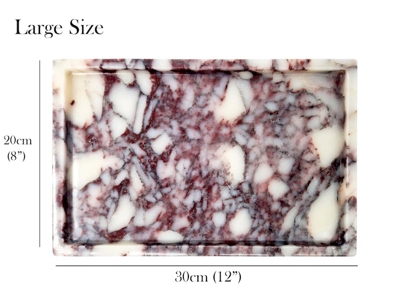 May include: Rectangular tray with a marbled pattern in shades of burgundy and white. The tray is 12 inches long and 8 inches wide. The words "Large Size" are at the top.
