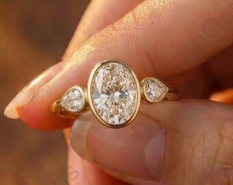 Three Stone Promise Ring, 1.5 Ct Oval Cut Lab Grown Engagement Ring With Side Pear Diamond, Bezel Setting Bridal Ring, 14K Yellow Gold Ring