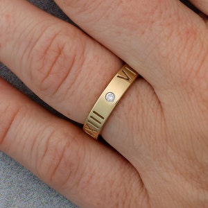 Cartier roman numeral ring hot sale