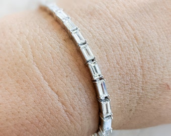 Baguette Diamond Tennis Bracelet - 6.5 Carat Weight. Available in Lab grown and Natural Diamond.