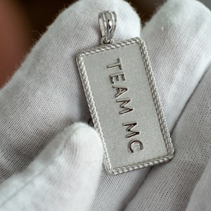 Custom embossed text pendant - Available in 14k, 18k and Platinum. Fully customizable