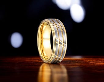 Anillo de tungsteno bicolor: alianza de boda tallada en oro y plata.
