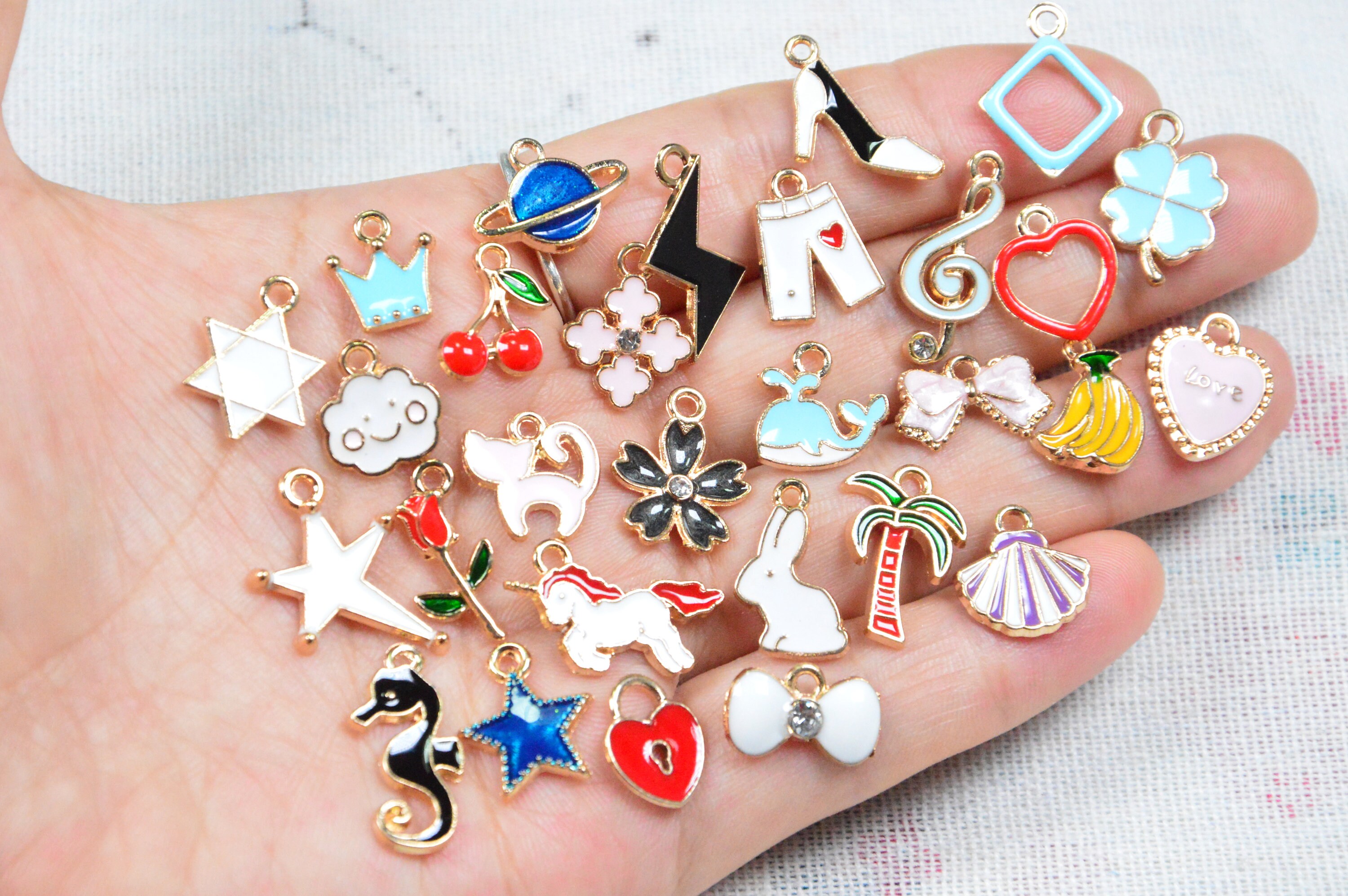 thumbnail image 2 of Pack Of 80 Heart Planet Enamel Charms Gold Plated Colored... 2 of 14