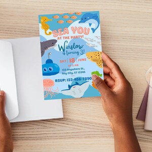May include: A colorful invitation with an ocean theme. The invitation features cartoon illustrations of sea creatures like a seahorse, shark, dolphin, and stingray. Text on the invitation reads 'SEA YOU AT THE PARTY! Winslow is turning 3!' with the date, time, and RSVP information.

Ocean Birthday Invitation - Editable Canva Template - 5x7 Under the Sea Birthday Invite