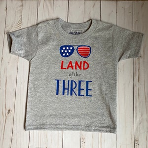 Land of the Three T-Shirt: 4th of July Birthday Toddler Shirt