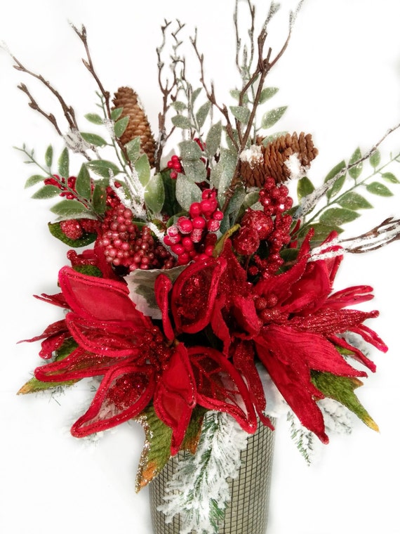 silver and white christmas flower arrangements