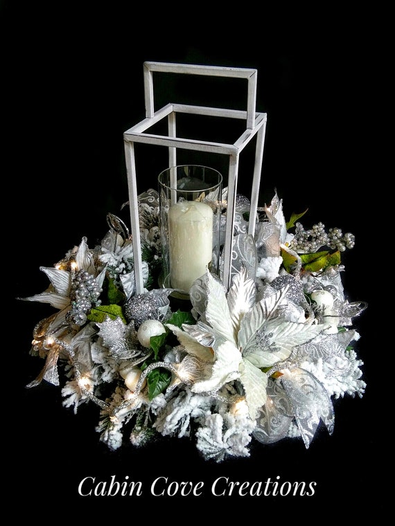 silver and white christmas flower arrangements