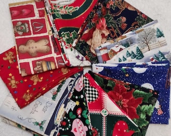 May include: A collection of Christmas-themed fabric squares arranged in a circular pattern. The fabrics feature various festive designs, including gingerbread men, teddy bears, poinsettias, and winter scenes. Colors include red, green, blue, and white.
