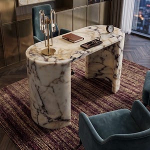 May include: An office interior with a marble desk, teal chairs, and a patterned rug. The desk has a curved design. A gold lamp and a painting with red and gold accents are also visible. The room offers a view of a cityscape.