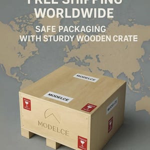 May include: A light-coloured wooden crate with the text "MODELCE" and "FRAGILE" labels. The crate has the text "FREE SHIPPING WORLDWIDE" and "SAFE PACKAGING WITH STURDY WOODEN CRATE" in white.