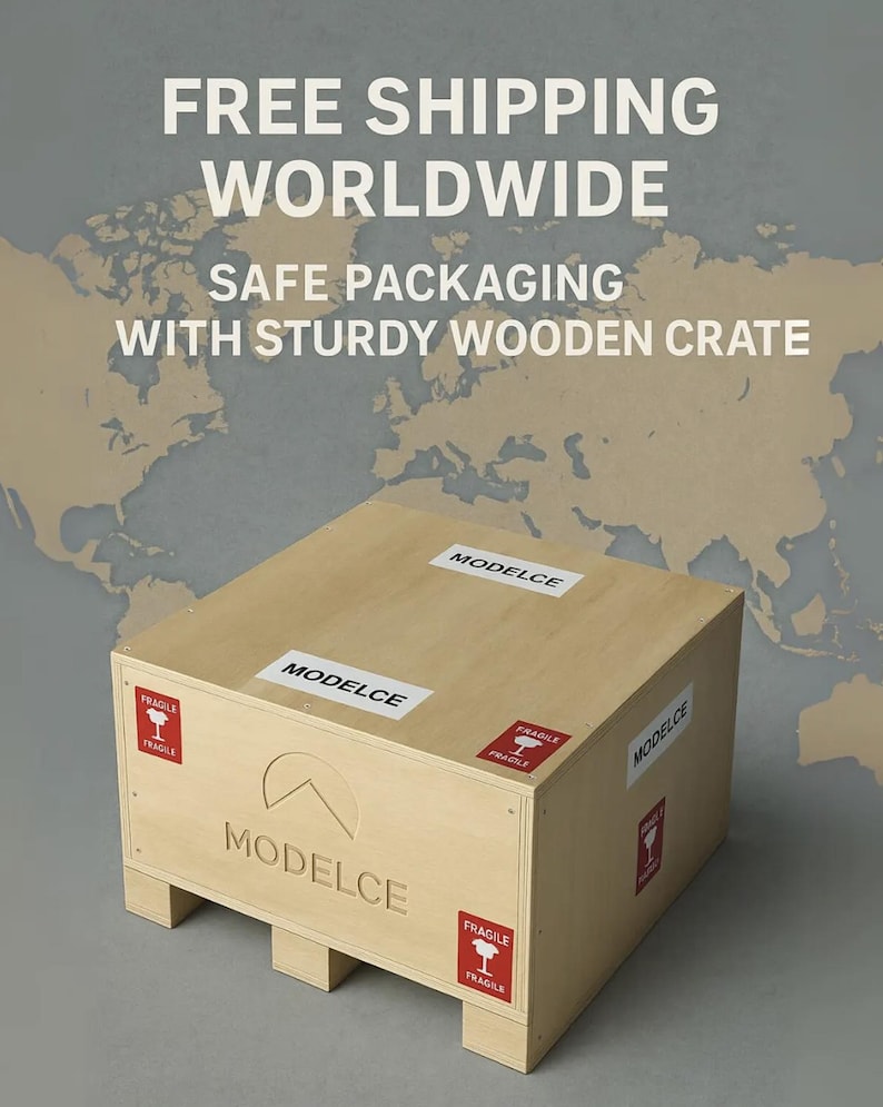 May include: A light-coloured wooden crate with the text "MODELCE" and "FRAGILE" labels. The crate has the text "FREE SHIPPING WORLDWIDE" and "SAFE PACKAGING WITH STURDY WOODEN CRATE" in white.
