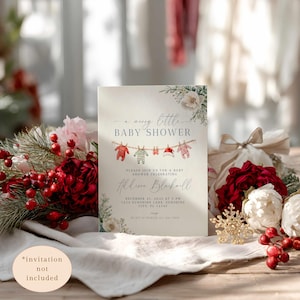 May include: Baby shower invitation with watercolor illustrations of baby clothes hanging on a clothesline. The invitation includes the text "a merry little BABY SHOWER" and event details. Floral and berry accents frame the card.