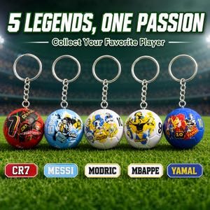 May include: Five soccer ball keychains featuring player graphics and numbers. The text reads 5 LEGENDS, ONE PASSION, Collect Your Favorite Player, CR7, MESSI, MODRIC, MBAPPE, and YAMAL. Each keychain has a silver metal ring and chain attached to a ball.