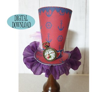 May include: A red and white paper hat with a blue anchor and wheel design. The hat has a purple ruffle trim and a pocket watch charm.