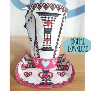 May include: A printable template for a paper hat shaped like a tall hat with a red and white heart pattern. The hat is decorated with a black and white checkered pattern and the letter "I" in a black and white font. The text "DIGITAL DOWNLOAD" is in a blue oval.