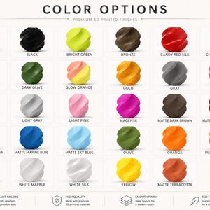 Op de afbeelding: Een kleurenkaart getiteld COLOR OPTIONS PREMIUM 3D PRINTED FINISHES met dertig kleine, spiraalvormige, bolvormige objecten in diverse kleuren, waaronder beige, zwart, felgroen, brons, rood, champagne, grijs, olijf, oranje, goud, roze, wit, blauw en paars.