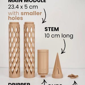 May include: A beige Moss Buddy V1 set, including a main module (23.4 x 5 cm), stem (10 cm long), dripper, and clips. The main module has smaller holes. The set is designed for plant care.