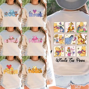 Celebrate the magic of Disney with this Pooh and Friends group sweatshirt, featuring beloved characters like Pooh, Piglet, Tigger, Eeyore, Kanga, and Roo. This cozy crewneck is perfect for family matching outfits at Disney World, Magic Kingdom trips, birthdays, or holidays. Made for warmth and comfort, it’s an ideal gift for fans of the Hundred Acre Wood.