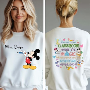 This personalized teacher sweatshirt features a fun Mickey Mouse-inspired design with your custom name. Cozy and soft, it's perfect for back-to-school, classroom style, or Disney trips. A thoughtful gift for any teacher who loves spreading magic and learning!