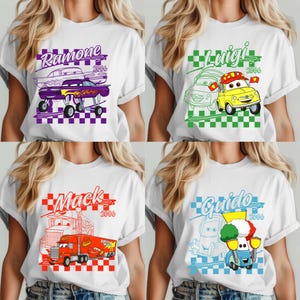 May include: White t-shirts with colorful cartoon car graphics. Each shirt features a different character name: Ramone, Luigi, Mack, and Guido, along with the year 2006. The designs are set against checkered backgrounds.