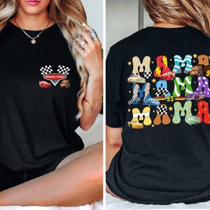 May include: Black t-shirt featuring a pocket design with a checkered flag and race cars. The back of the shirt displays the word "MAMA" in various colors and car designs, along with the number "95".