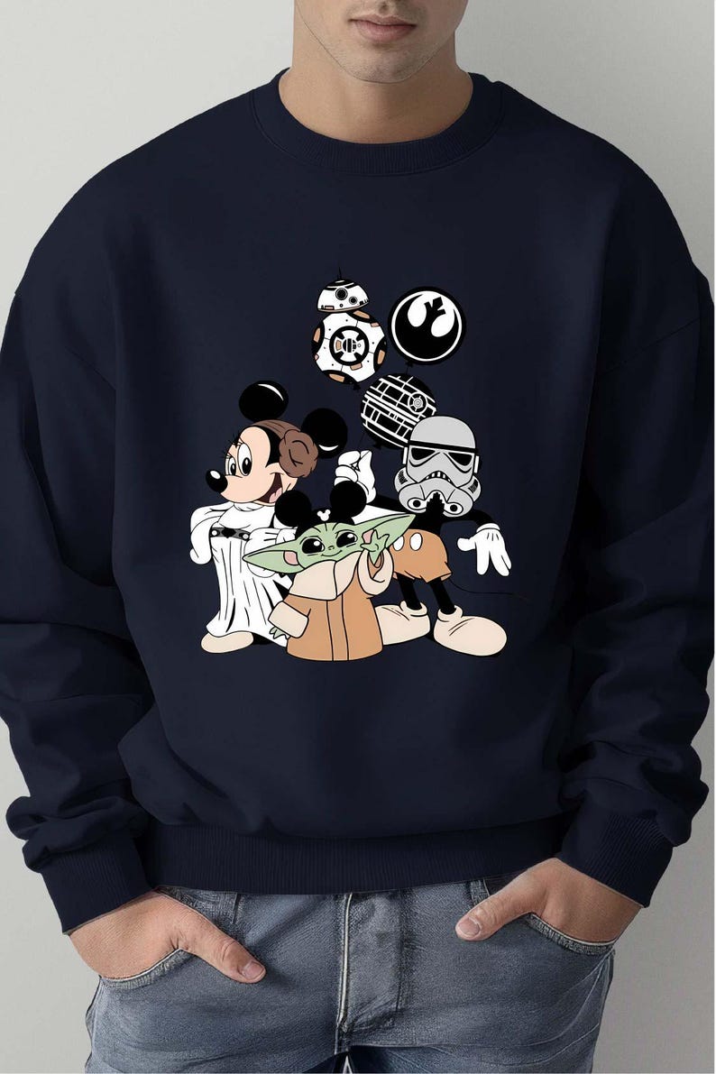Star Wars Minnie Baby Yoda sweatshirt featuring Baby Yoda, Minnie Mouse, and Darth Vader. Cozy crewneck perfect for Disneyland family trips and Star Wars fans in 2025. Soft, warm pullover with galaxy-themed design combining Disney magic and Star Wars adventure.