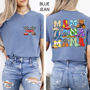 May include: A blue jean t-shirt with a graphic of race cars and checkered flags. The front of the shirt has the text "Mom Life" and the back has the word "MAMA" repeated with race car graphics and the number "95".
