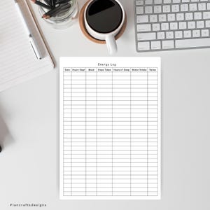 May include: A white paper energy log tracker with a grid layout featuring columns for Date, Hours Slept, Mood, Steps Taken, Hours of Sleep, Water Intake, and Notes. The header reads Energy Log in a simple black font on a clean white background.