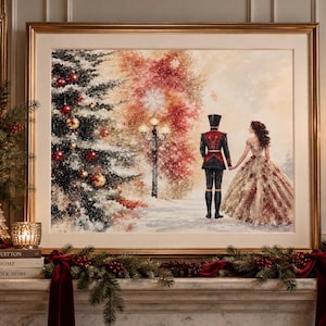 May include: A framed rectangular wall art print depicting a winter scene with a decorated Christmas tree, a street lamp, and two figures in formal attire walking through snow. The artwork features warm red and gold tones within a gold frame.