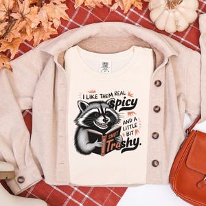 Spicy Reader Raccoon T-Shirt: Book Lover&#39;s Trash Panda Tee
