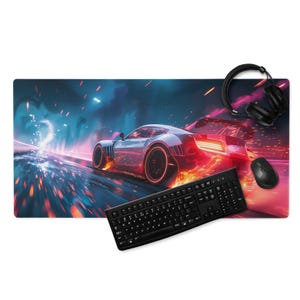 May include: Gaming mouse pad featuring a dynamic illustration of a futuristic race car speeding through a neon-lit tunnel. Includes a black keyboard, mouse, and headphones. The pad's design is vibrant with red, blue, and orange hues.