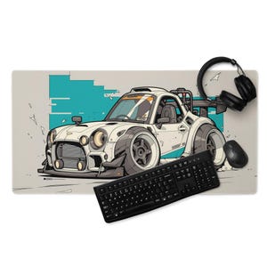 May include: A rectangular mouse pad featuring a white cartoon car with gray and teal accents. A black keyboard, mouse, and headphones are also visible. The car design has large wheels and a spoiler, suggesting a racing theme.