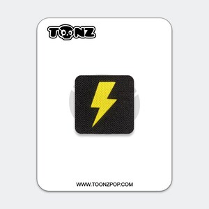 May include: A square black patch featuring a bright yellow lightning bolt icon in the center. The patch is displayed on a white backing card with the text TONZ at the top and the website URL WWW.TOONZPOP.COM printed at the bottom.