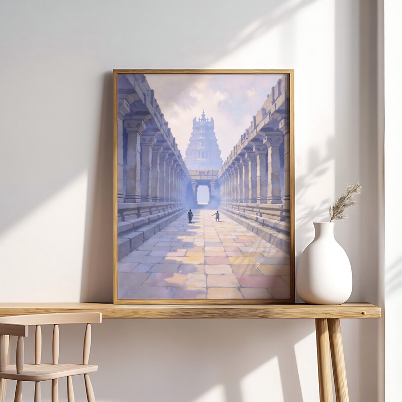 May include: Framed art print depicting a temple with a long corridor lined with columns. The artwork features a perspective view with two figures walking towards the temple. The color palette includes shades of blue, beige, and gold.
