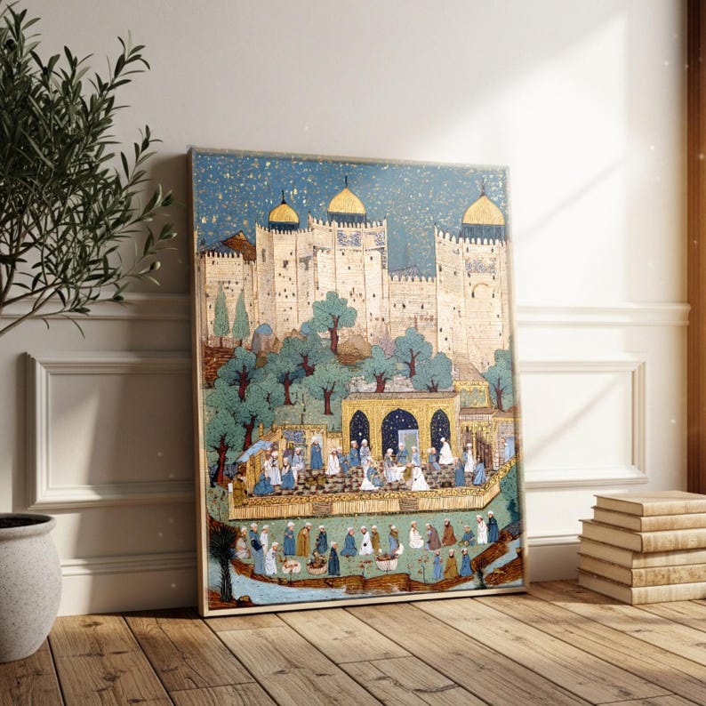 May include: An artistic print depicting a detailed scene of a Middle Eastern city with a fortress, trees, and figures in traditional attire. The artwork features a blue sky with gold accents and is framed in a wooden border.